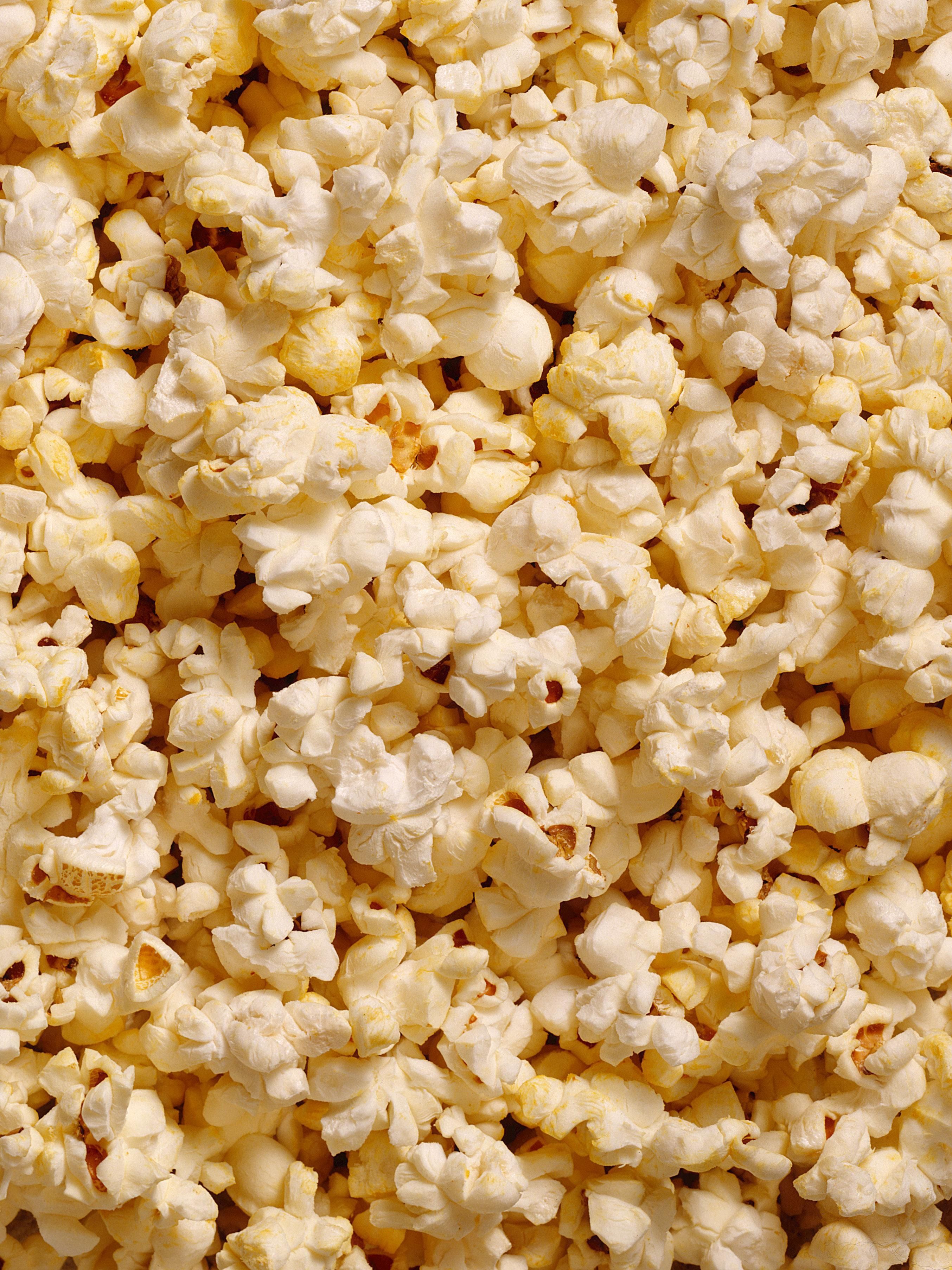 A close up of popcorn in the microwave - Popcorn