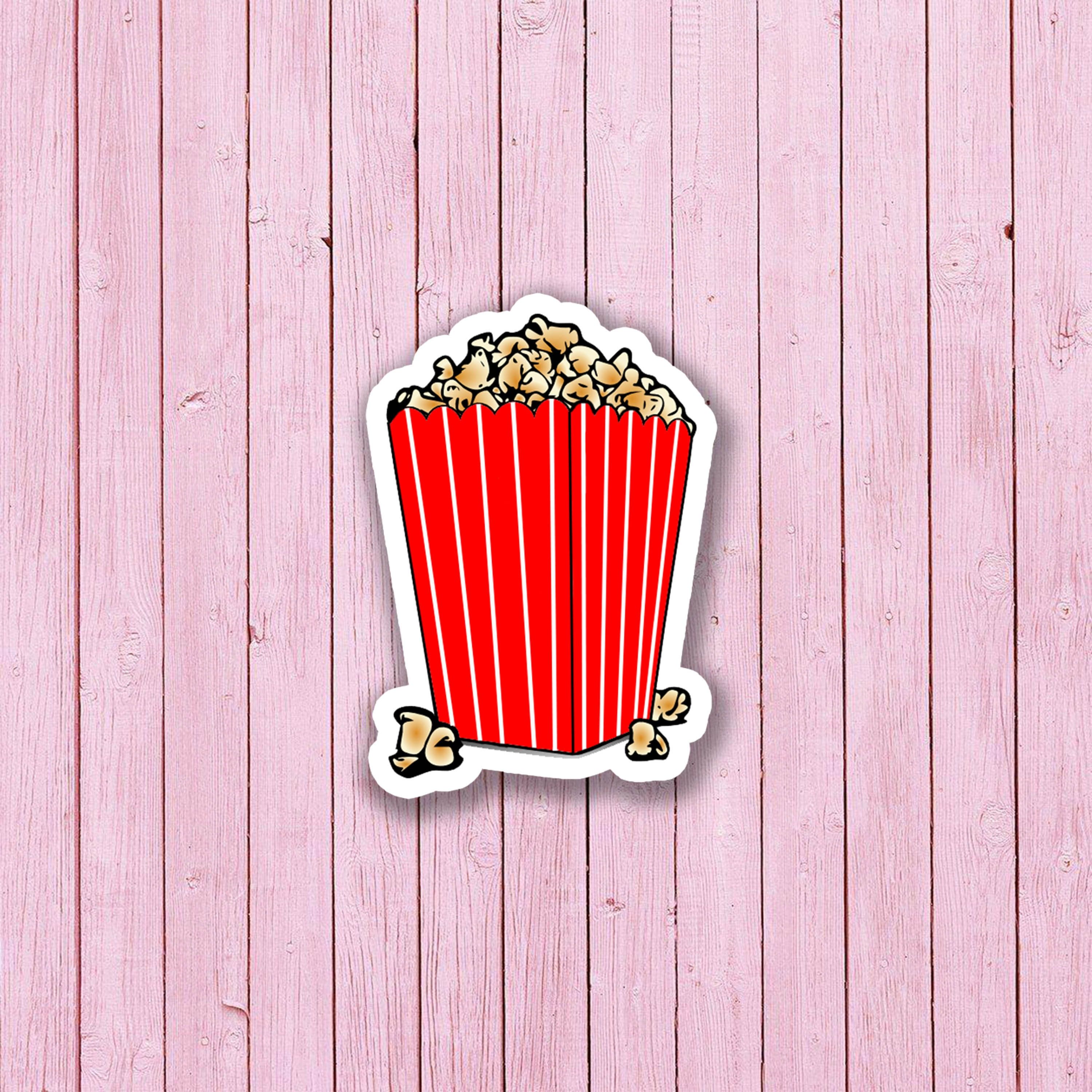 A sticker of popcorn in an open box - Popcorn