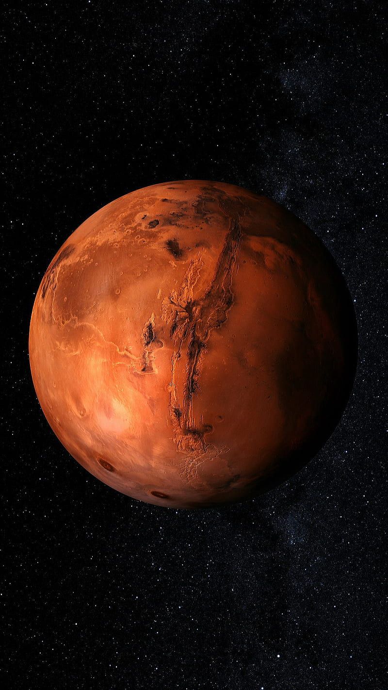 A red planet with black stars in the background - Mars