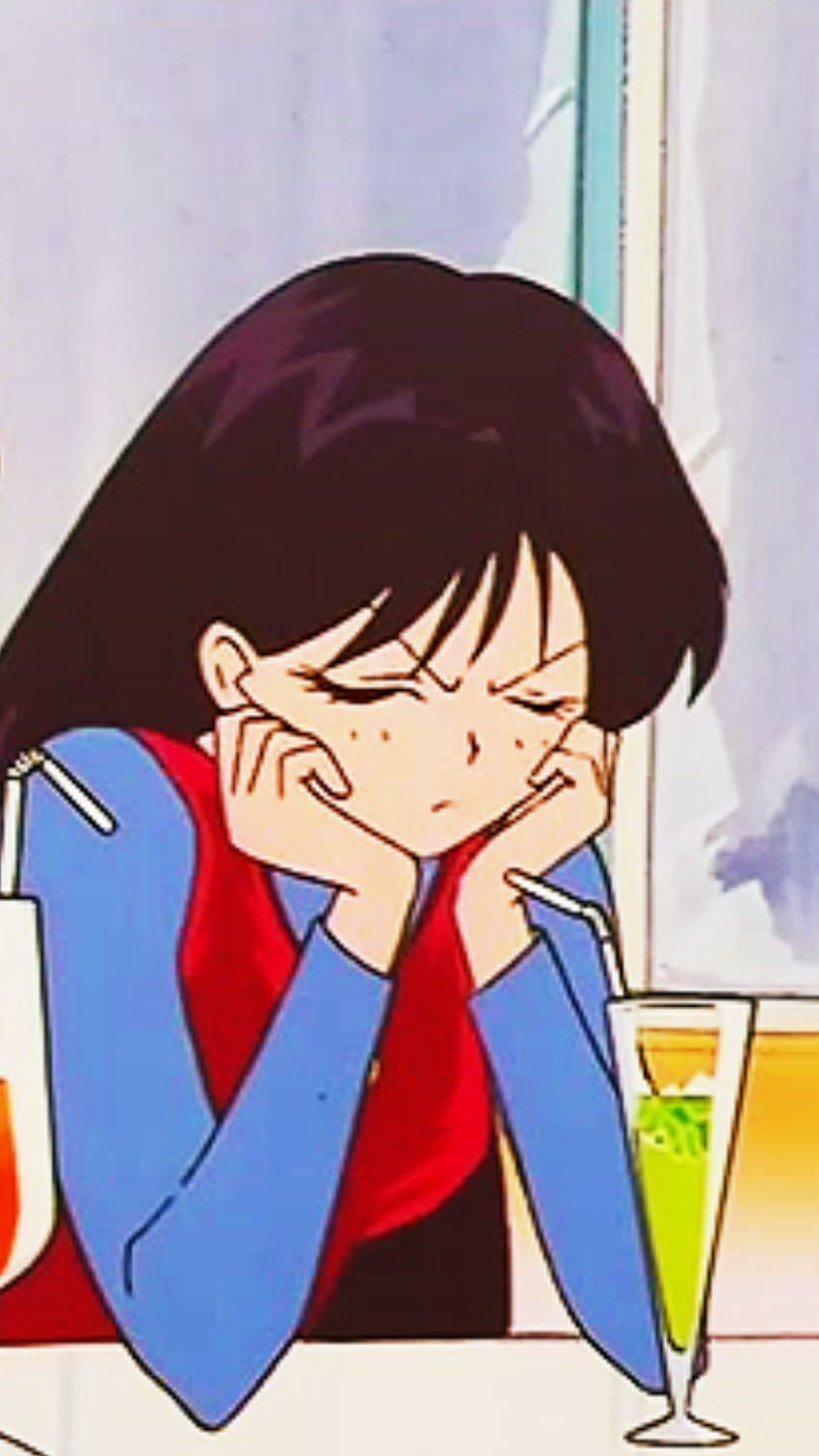 A girl sits at a table with a drink in front of her, her head in her hands. - Sailor Mars