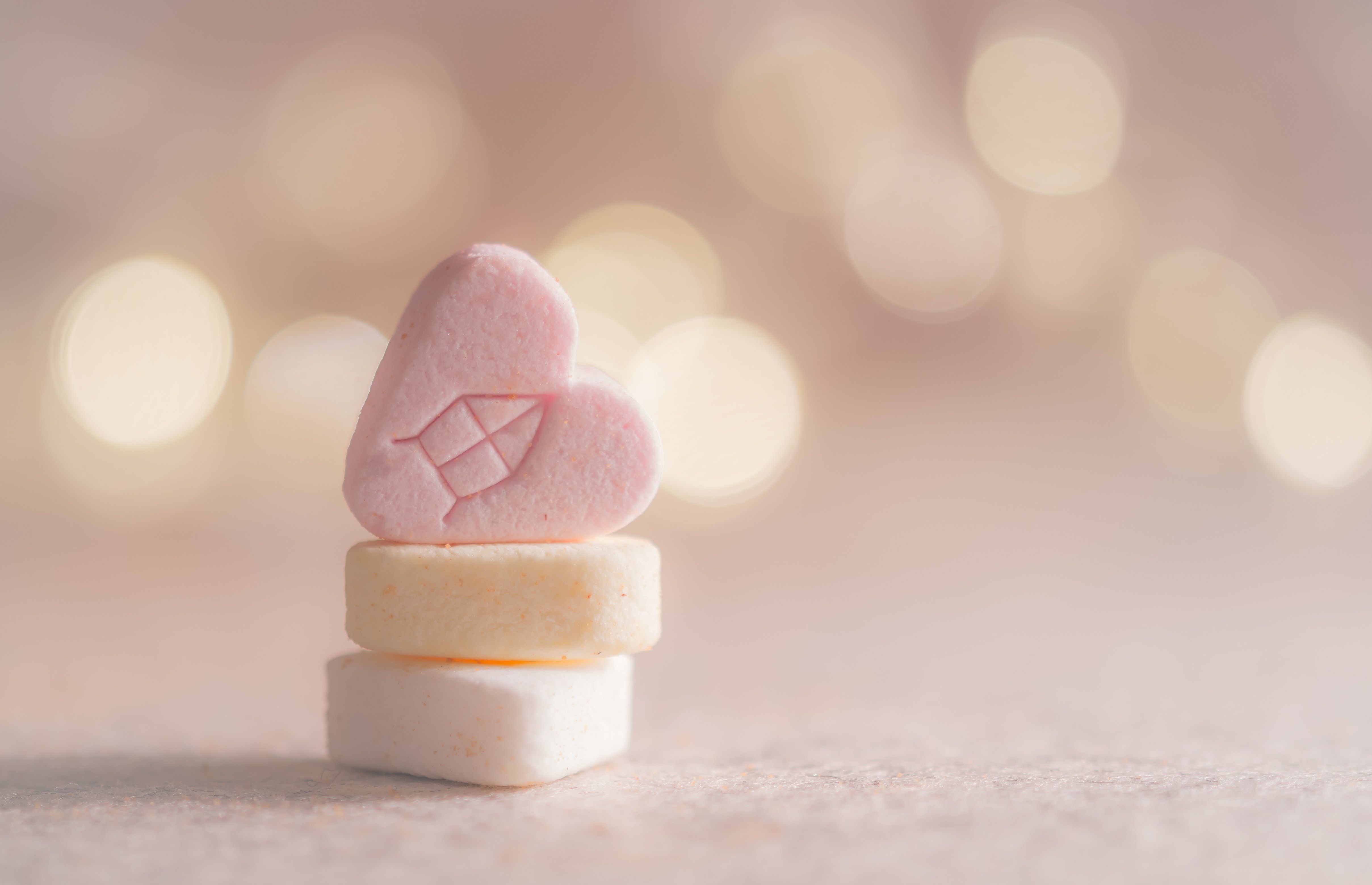 Three Beige, Yellow, and Pink Heart Marshmallows · Free