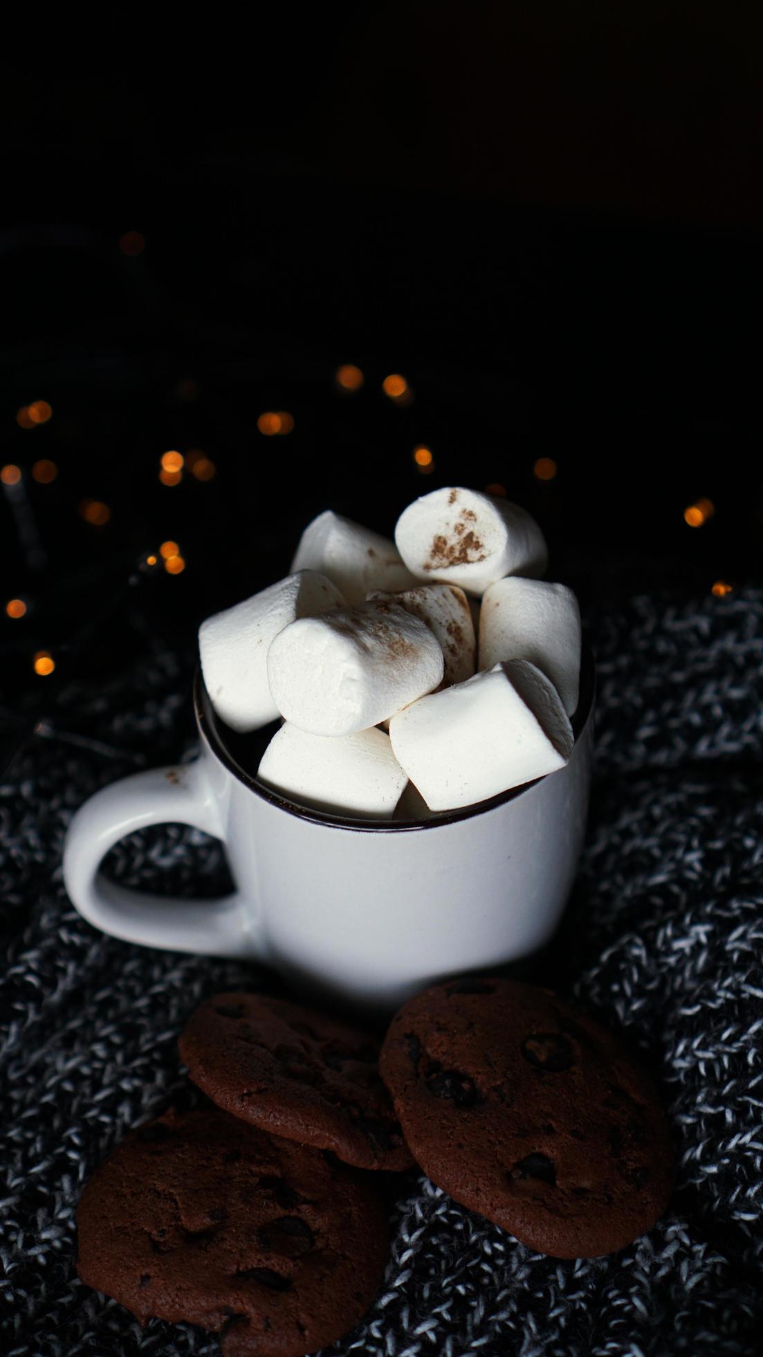 A mug of hot chocolate with marshmallows and chocolate chip cookies - Marshmallows