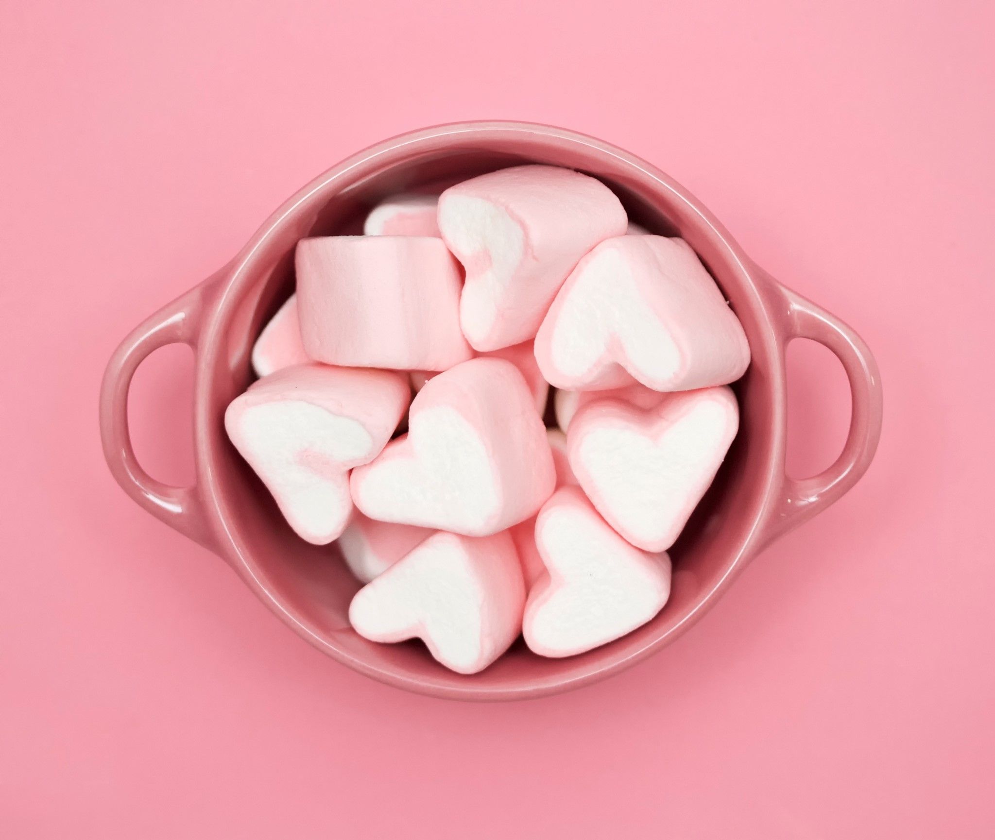 A bowl of marshmallows on pink background - Marshmallows