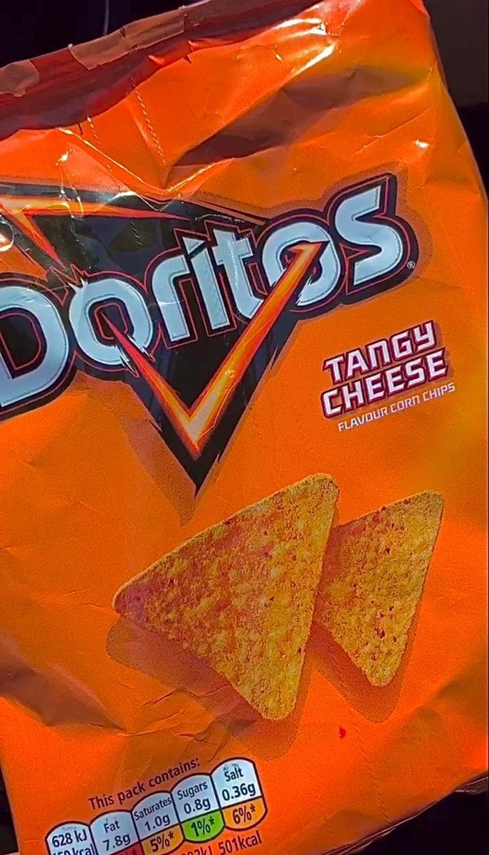A bag of doritos is shown on the table - Doritos