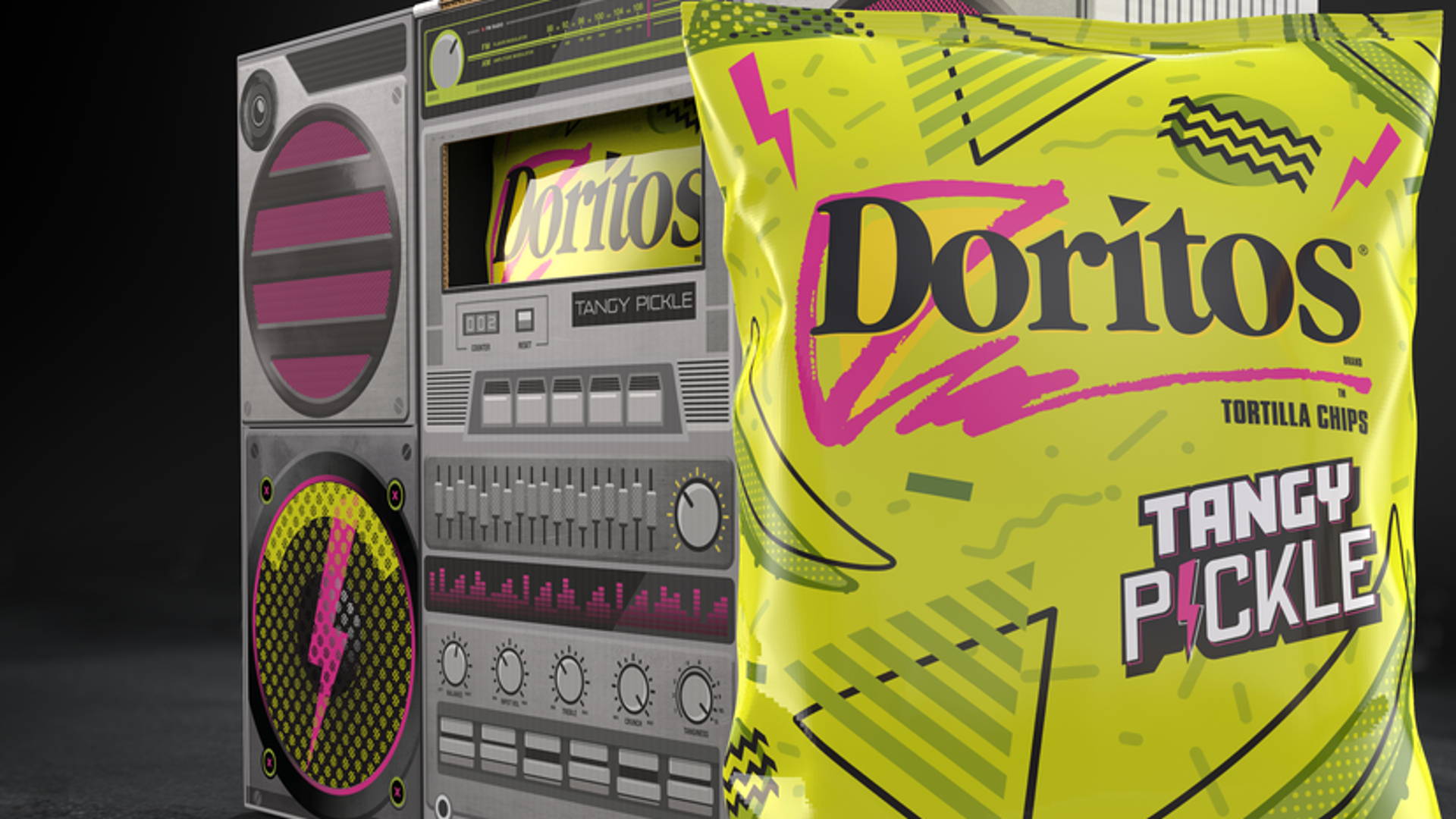 A bag of doritos tacos in front on some speakers - Doritos