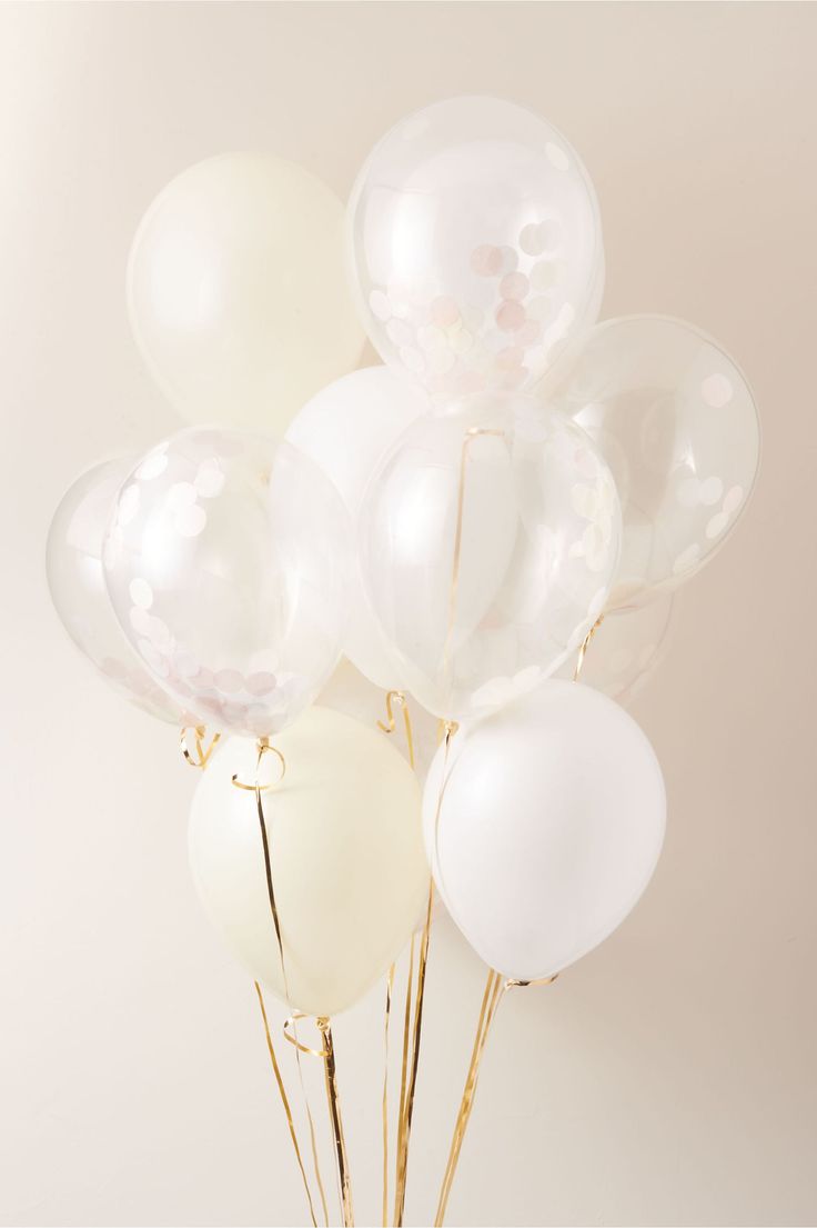 A bunch of white balloons with gold stems - Balloons