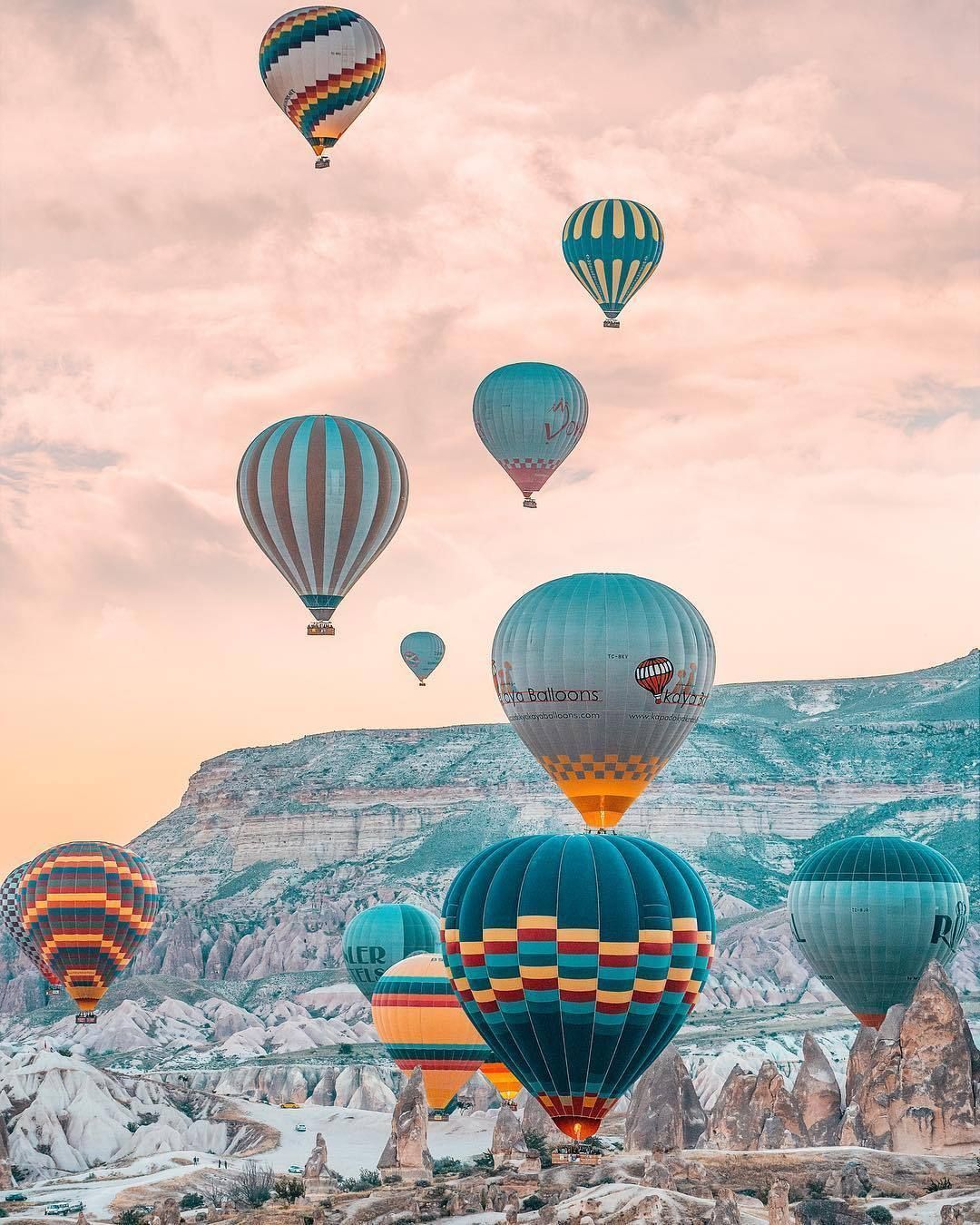 A group of hot air balloons flying in the sky - Hot air balloons