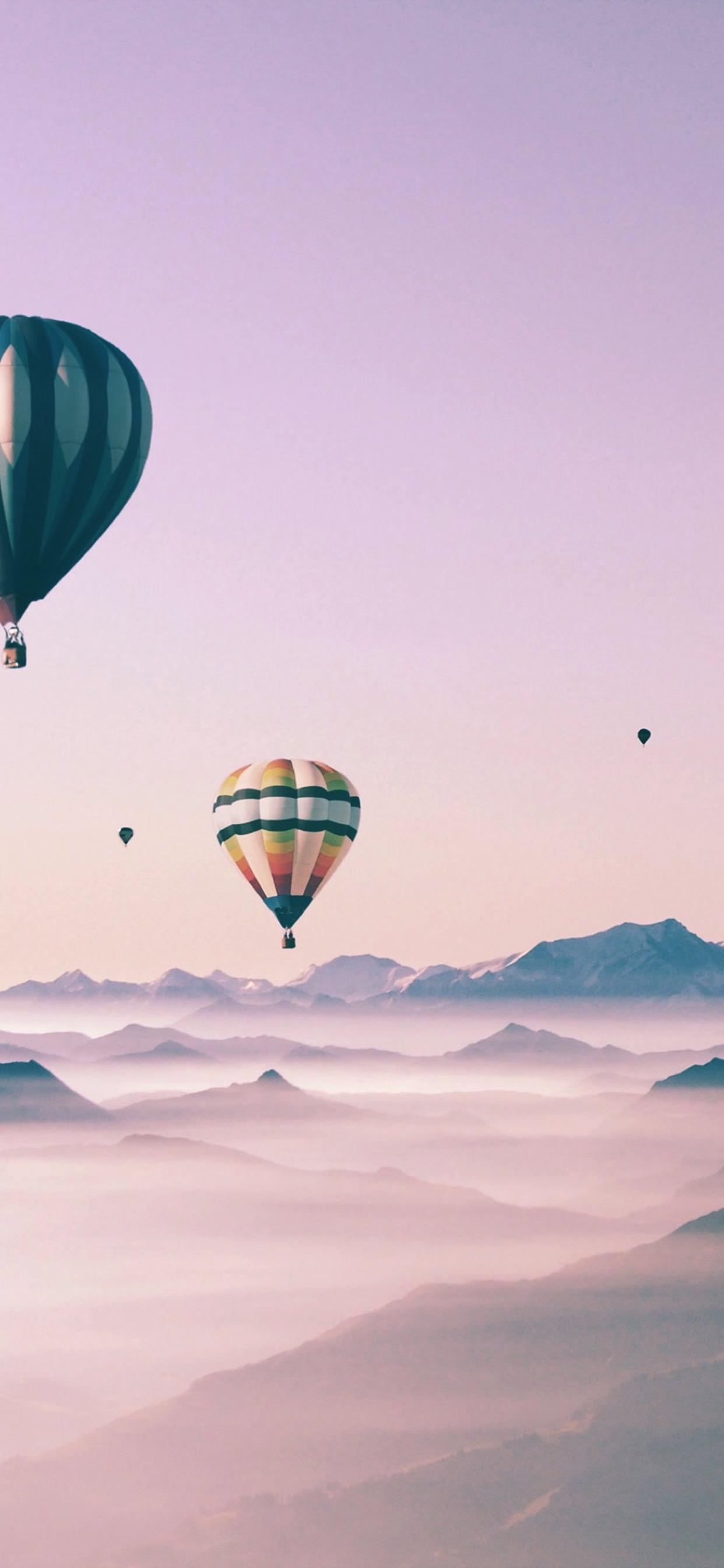 A group of hot air balloons flying in the sky - Hot air balloons, balloons