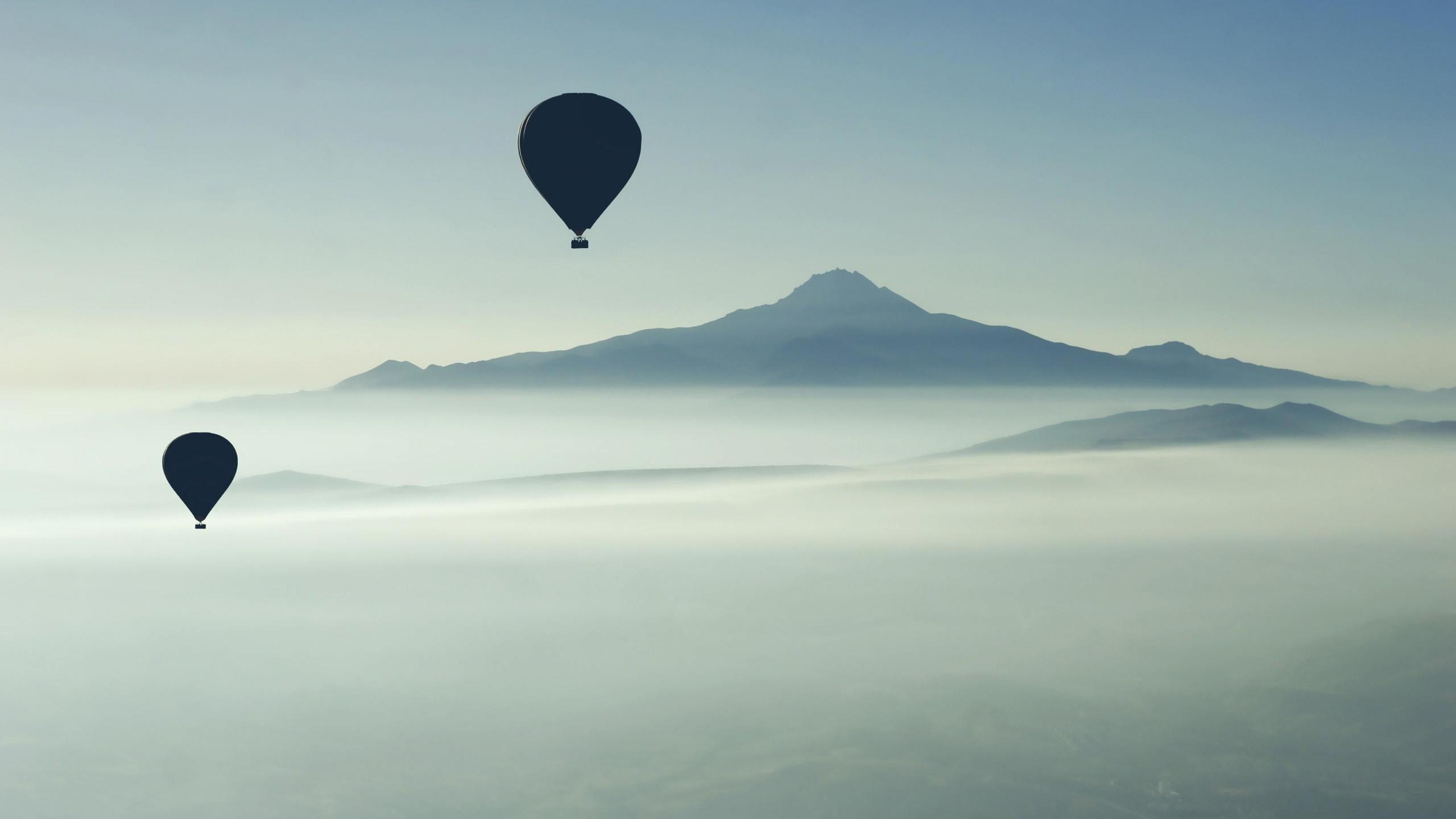 Wallpaper Blue Hot Air Balloon Flying Over The Mountains During Daytime, Background Free Image