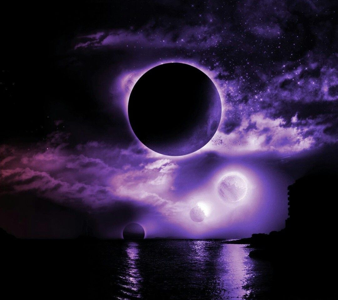 A purple sky with two moons and some clouds - Eclipse