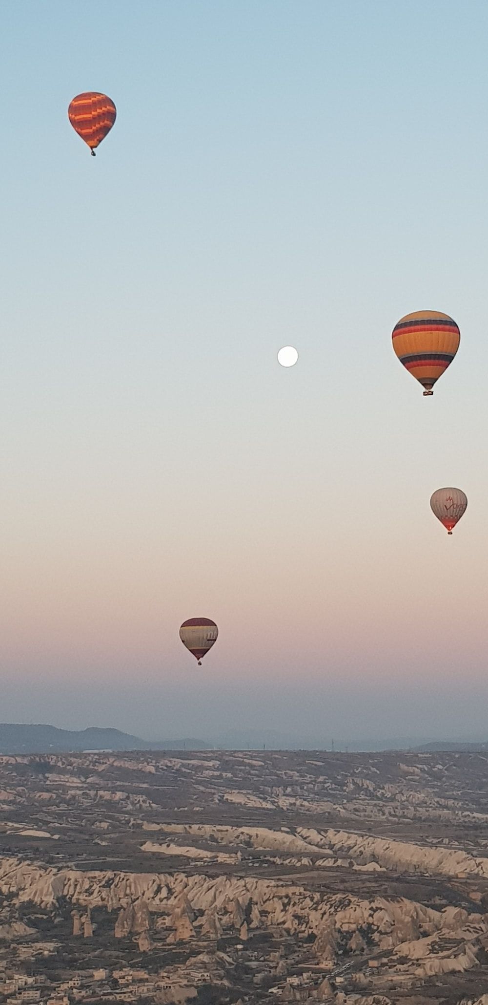 hot air balloons in the sky during sunset photo