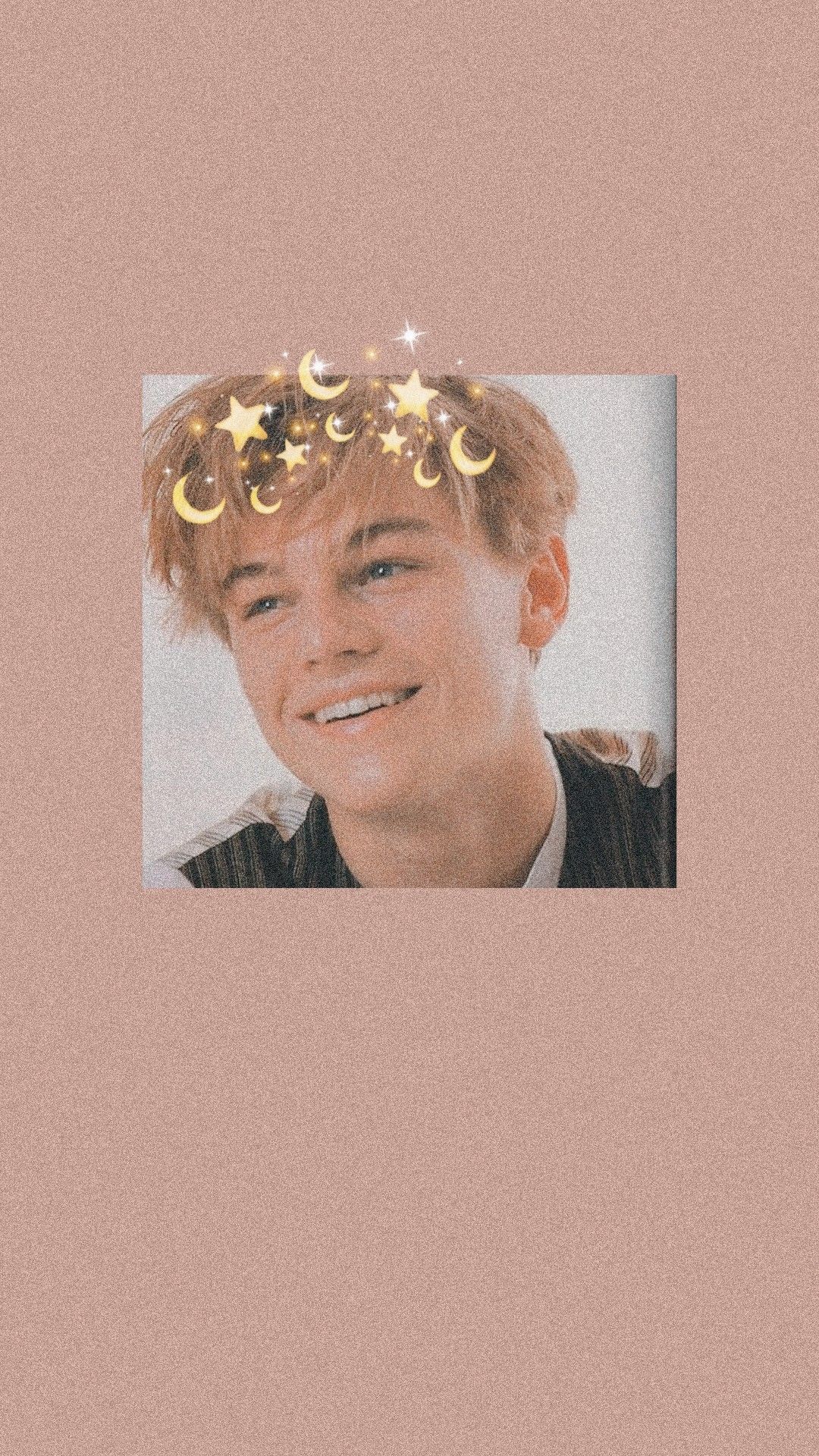 IPhone wallpaper of a smiling Leonardo DiCaprio with a gold crown of moons and stars - Leonardo DiCaprio
