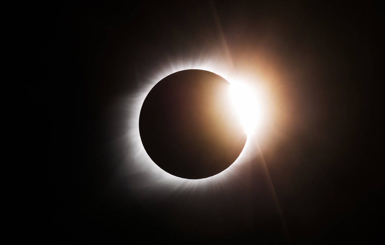 The moon covers the sun during a total solar eclipse in 2017. - Eclipse