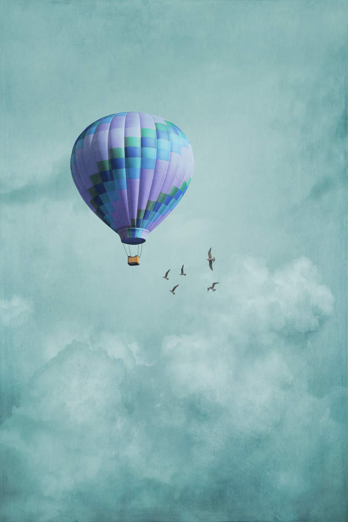 A hot air balloon with birds flying around it - Hot air balloons