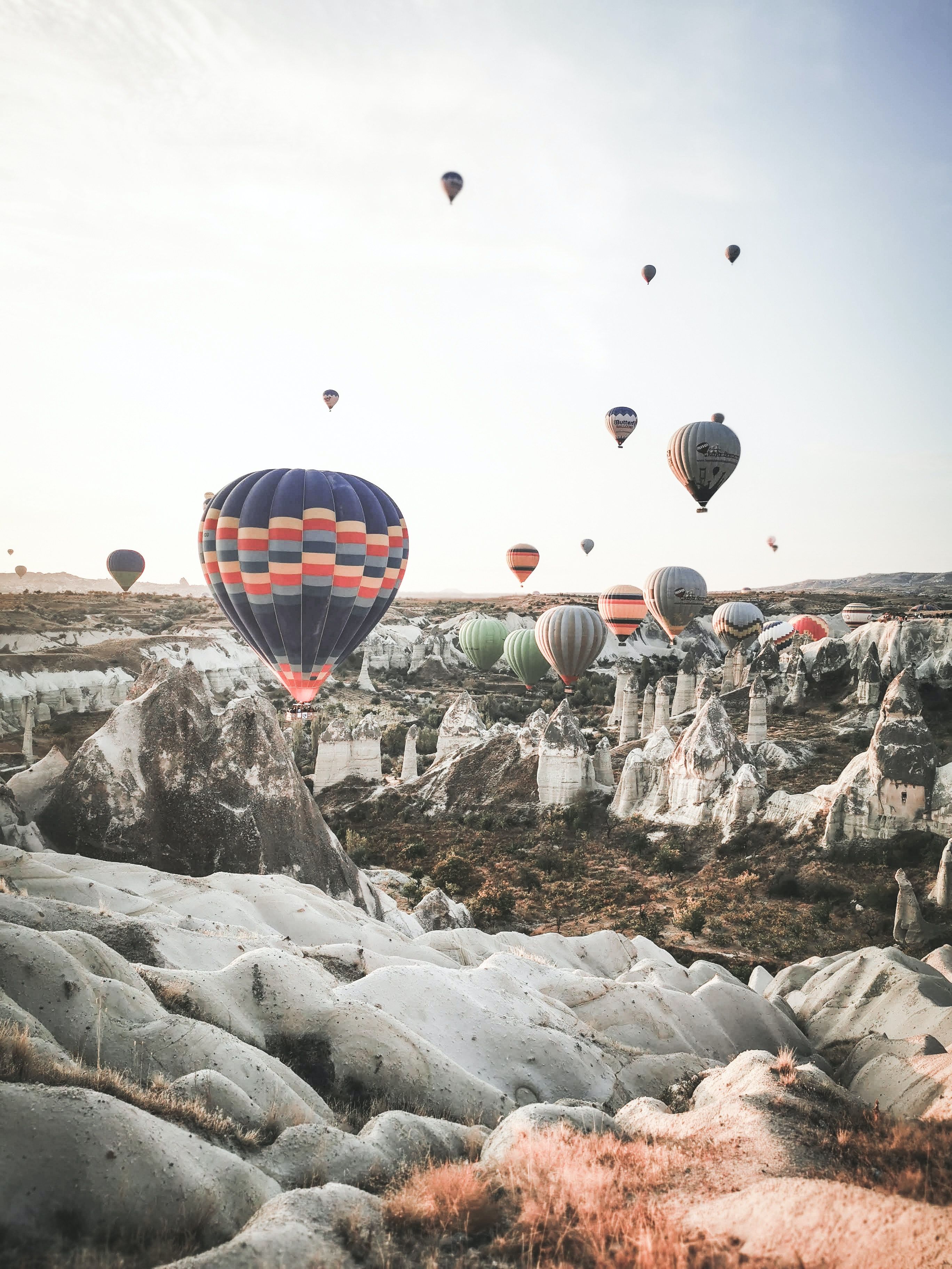 A group of hot air balloons flying in the sky - Hot air balloons