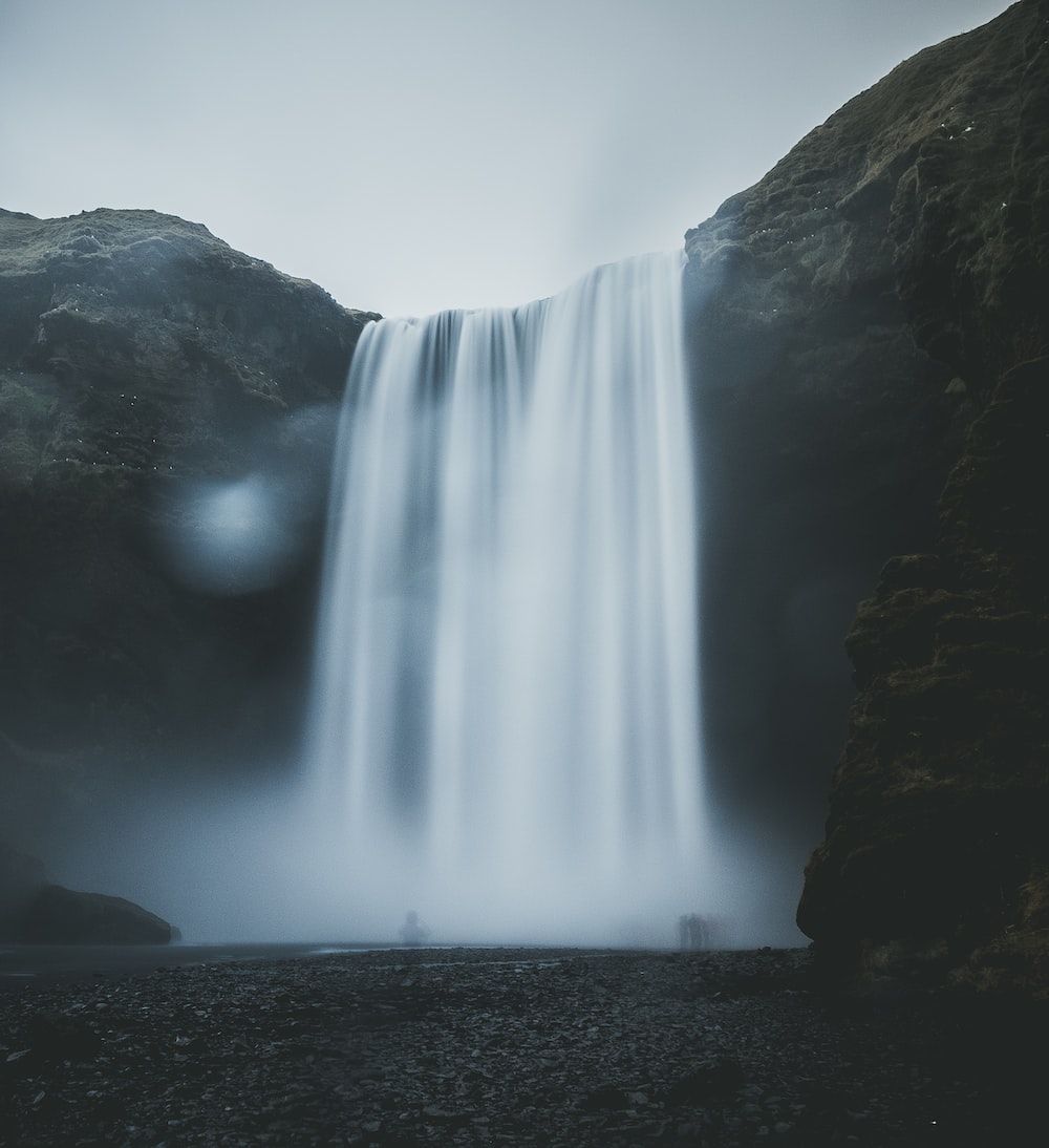 A waterfall is flowing down from the top - Waterfall