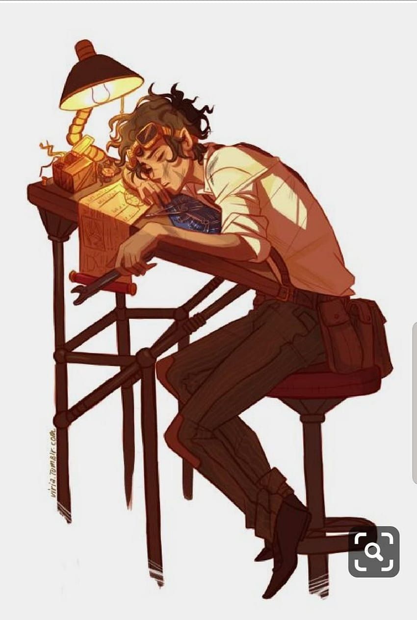 A man is sitting at his desk with an open book - Leo Valdez