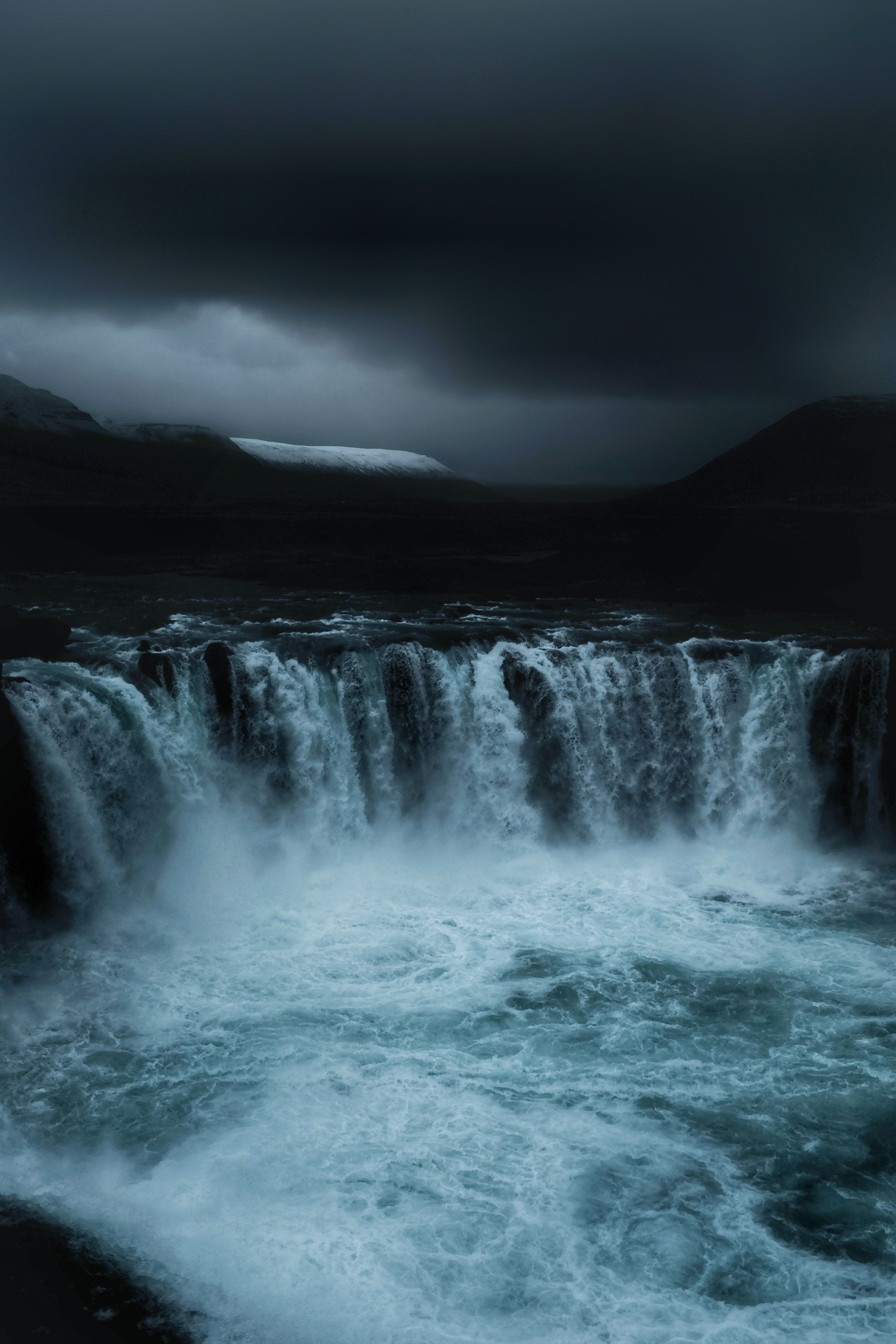 A waterfall in a stormy sky. - Waterfall