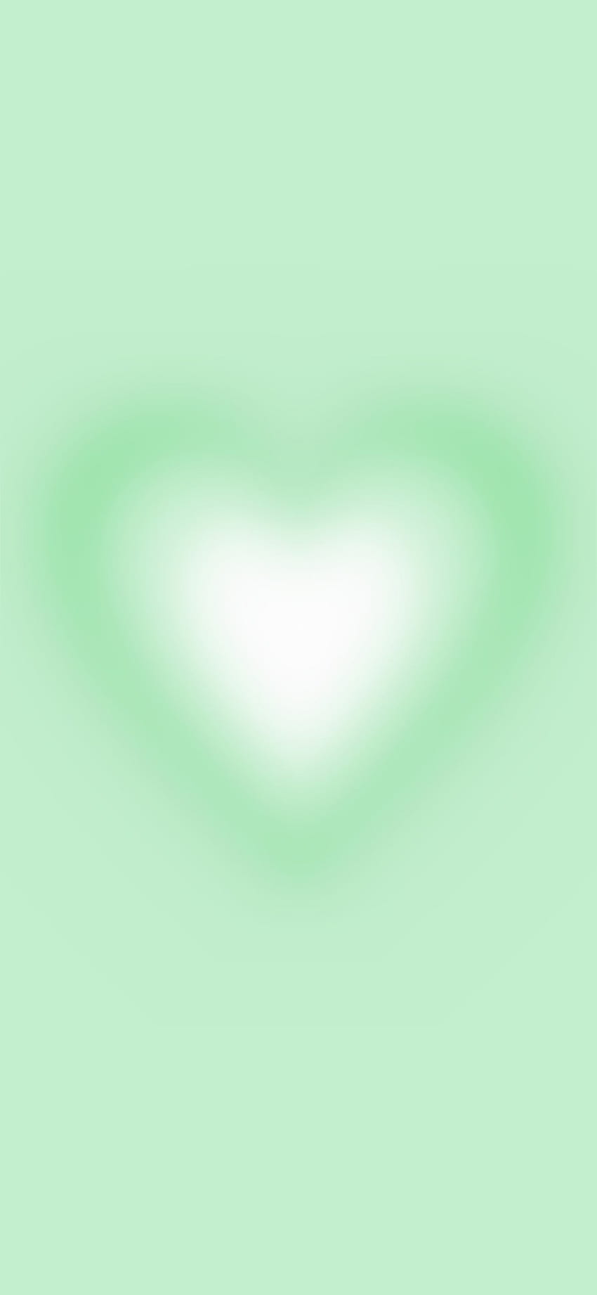 A green and white heart on a green background - Gradient