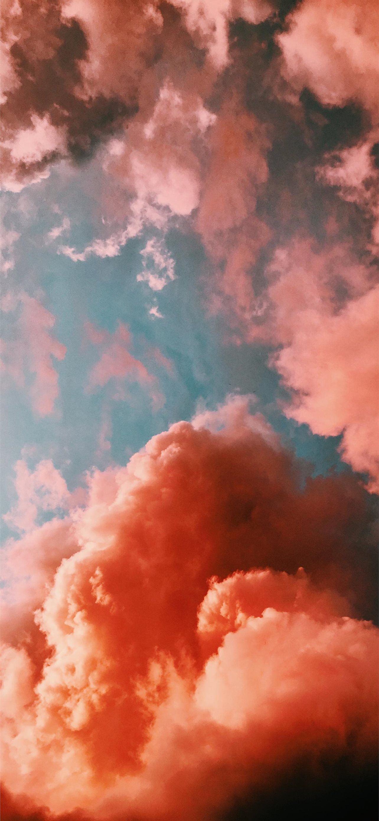 Aesthetic Clouds iPhone Wallpaper with high-resolution 1125x2436 pixel. You can use this wallpaper for your iPhone 5, 6, 7, 8, X, XS, XR backgrounds, Mobile Screensaver, or iPad Lock Screen - Coral