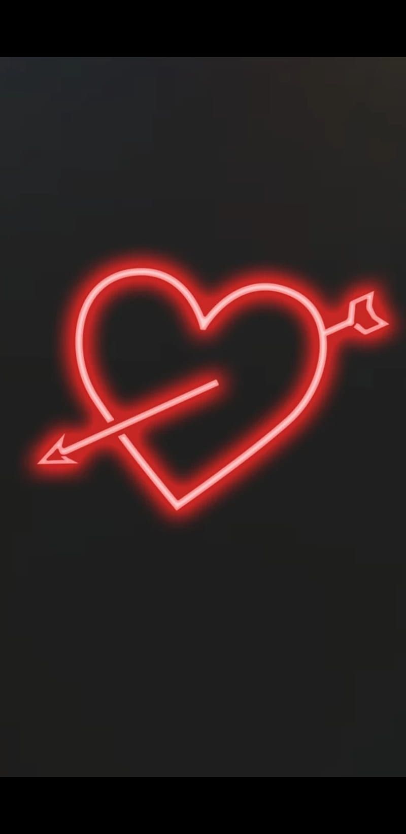 A neon heart with an arrow in it - Cupid