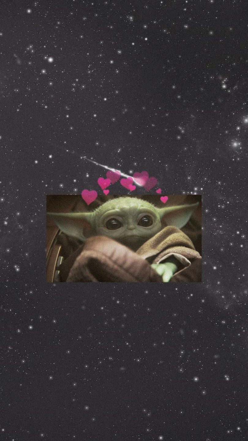 A baby yoda is in the middle of space - Baby Yoda