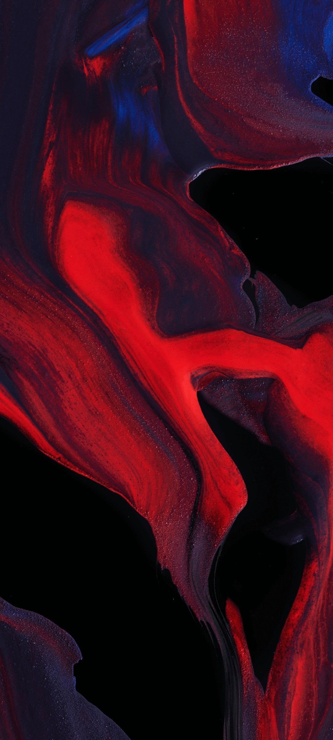 A close up of some red and blue paint - 1080x2400