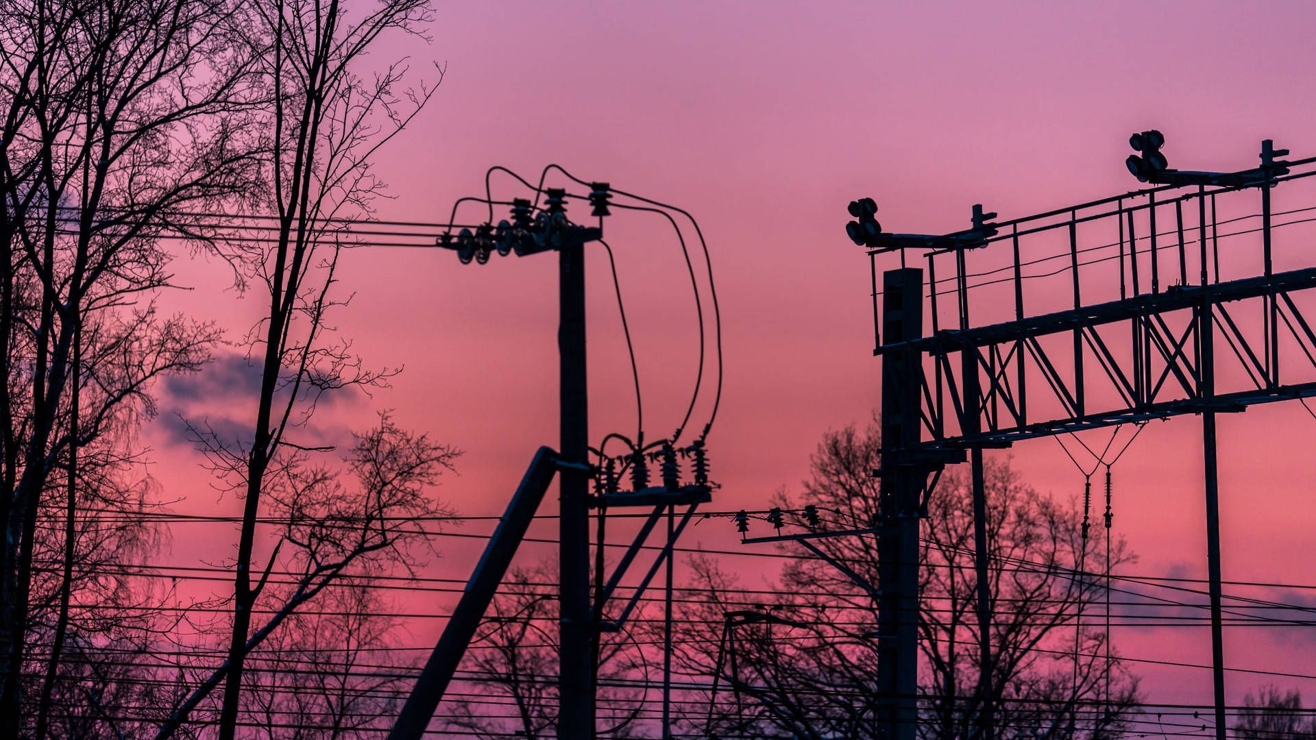 Electric wires and poles against a pink sky - 1920x1080