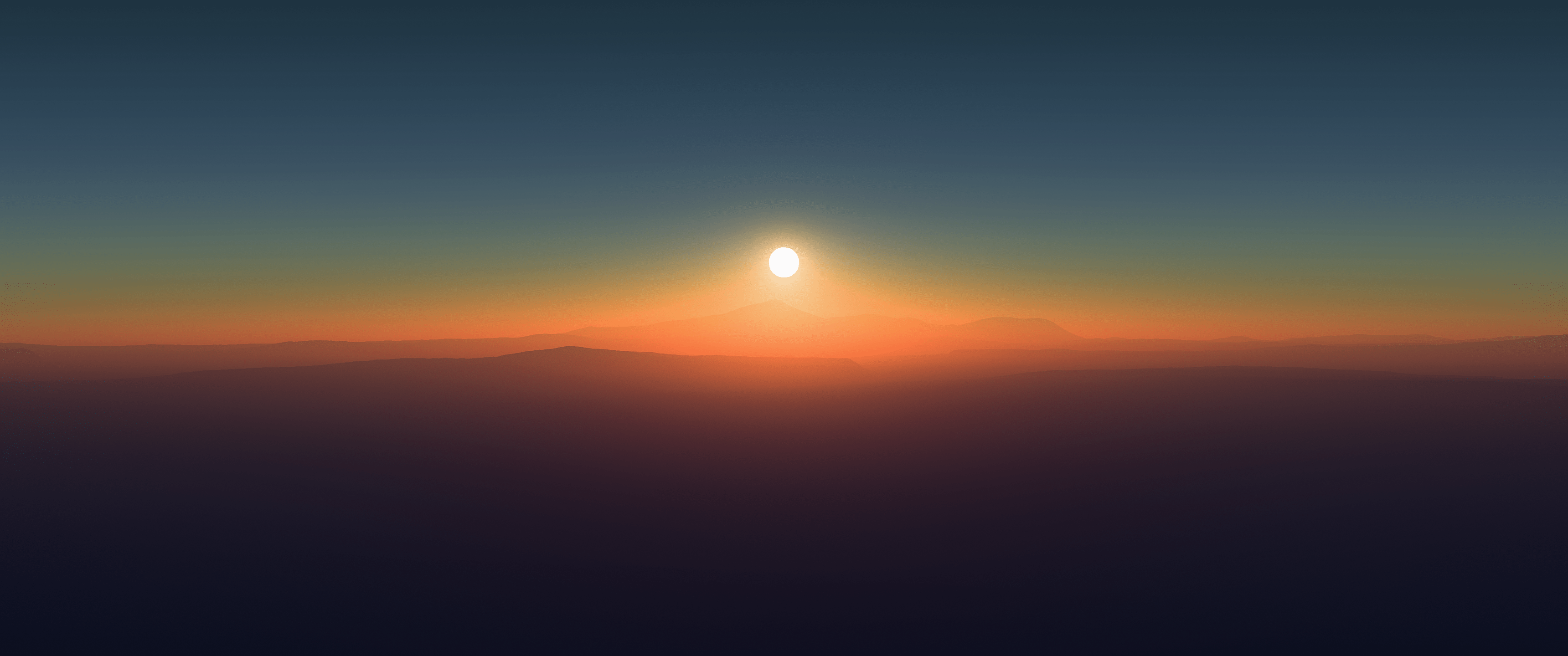A sunset with mountains in the background - 3440x1440
