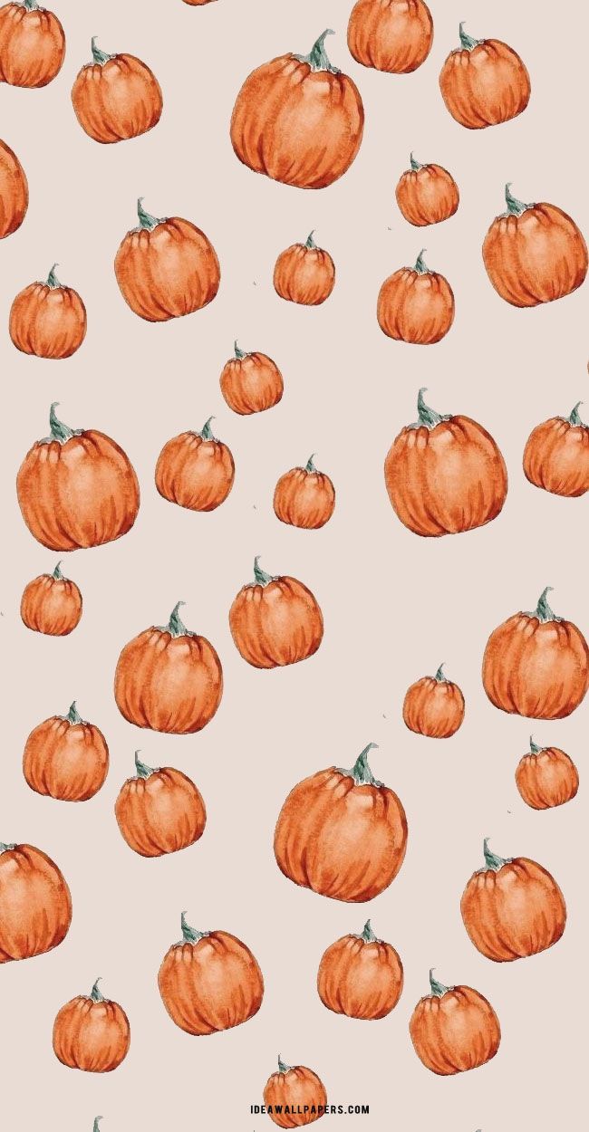 Free halloween phone wallpaper with a pattern of orange pumpkins on a tan background - Pumpkin