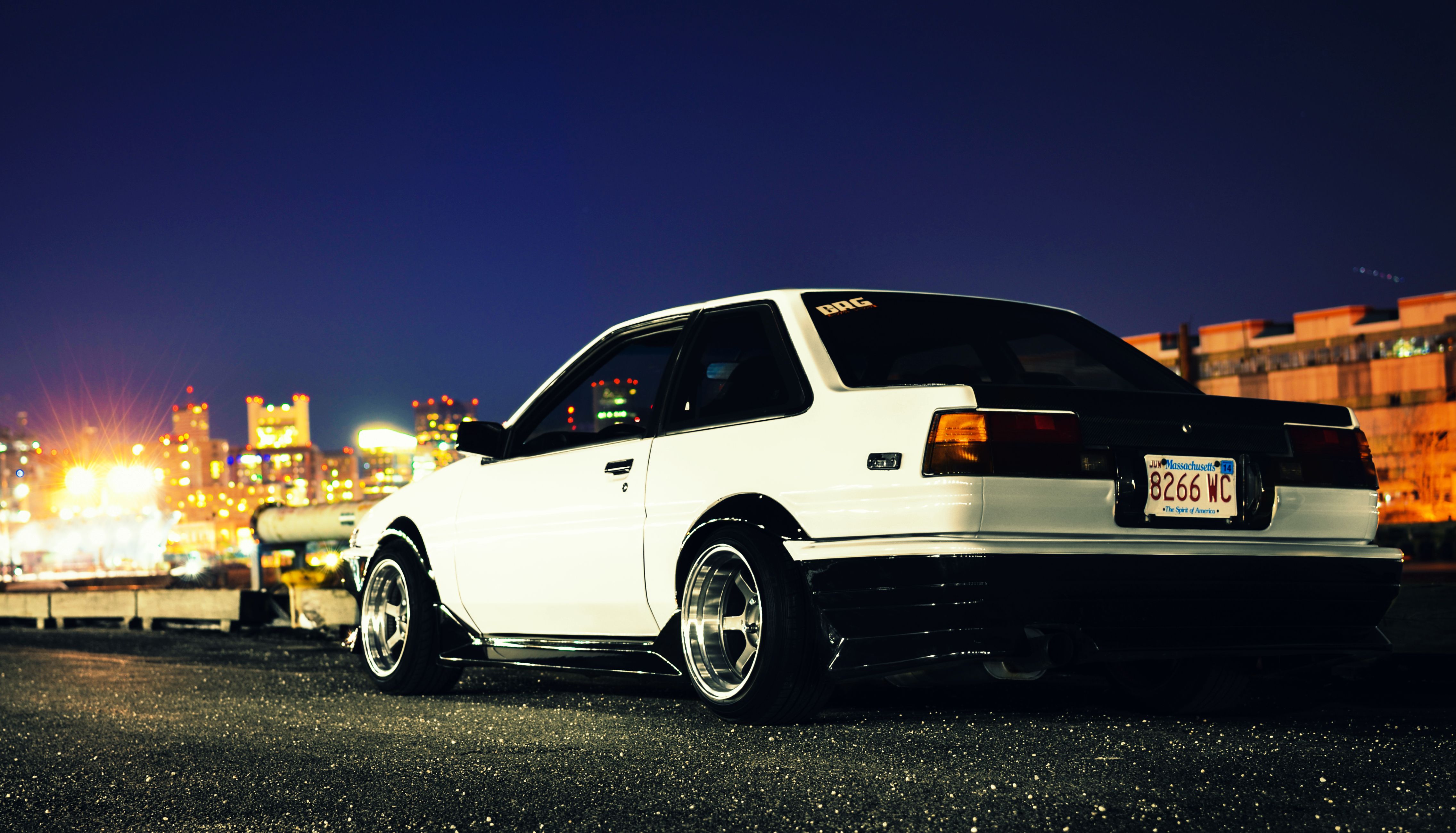 White car on the road at night - Toyota AE86
