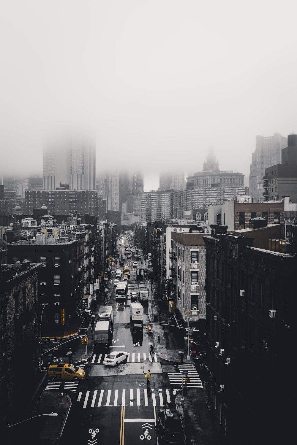 Grayscale photo of a city street - Cityscape