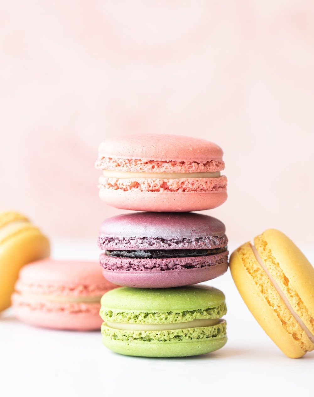 A stack of macarons on top each other - Bakery, macarons
