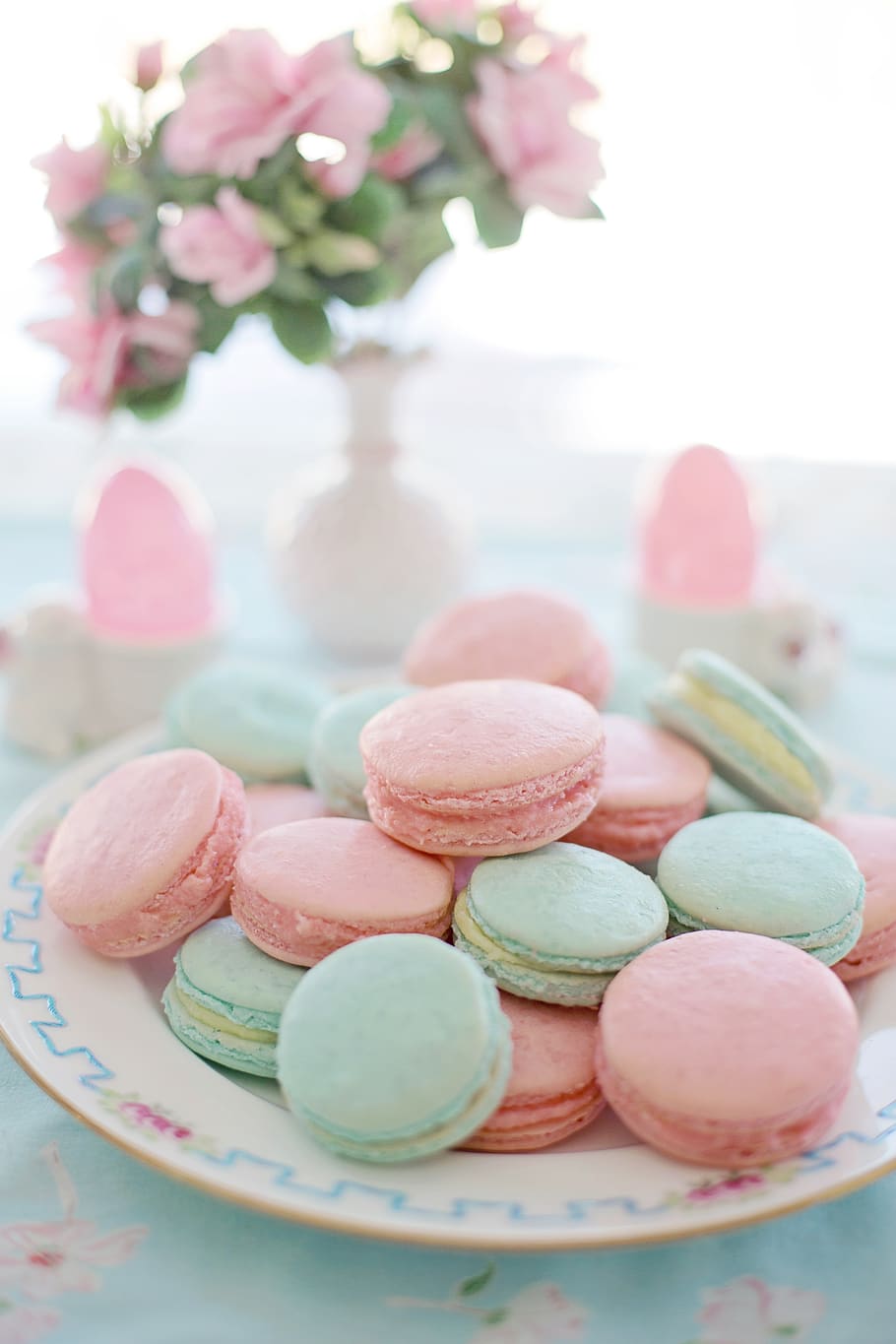 A plate of macarons in pastel colors on a table - Macarons