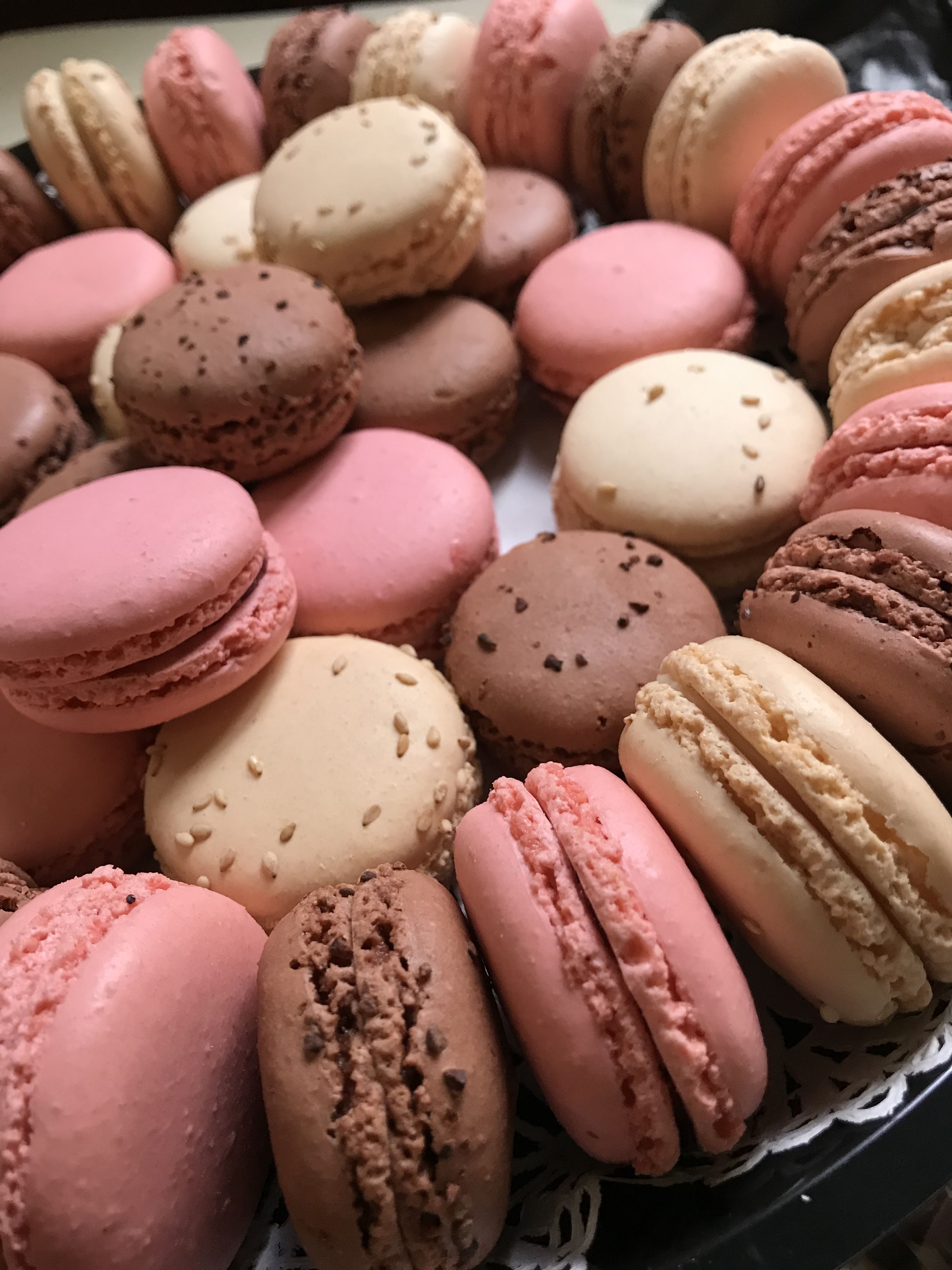 A tray of macaroons with different colors - Macarons