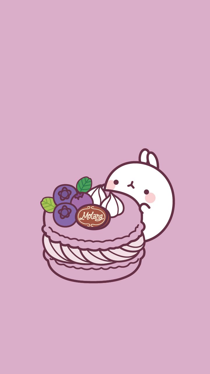 A cute cartoon bunny with purple and blue frosting - Macarons