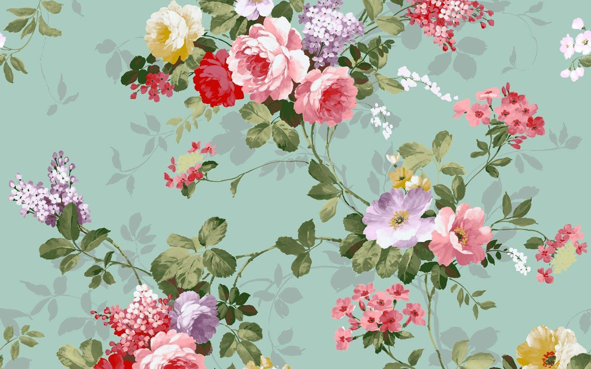 A vintage floral wallpaper design with pink, red, purple, and white flowers on a green background. - Coquette
