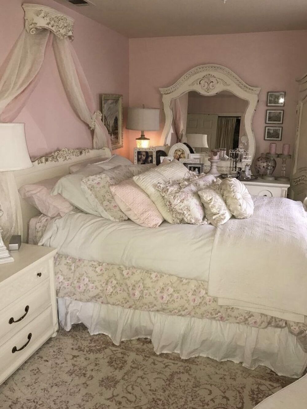 A bedroom with pink walls and white furniture. - Coquette