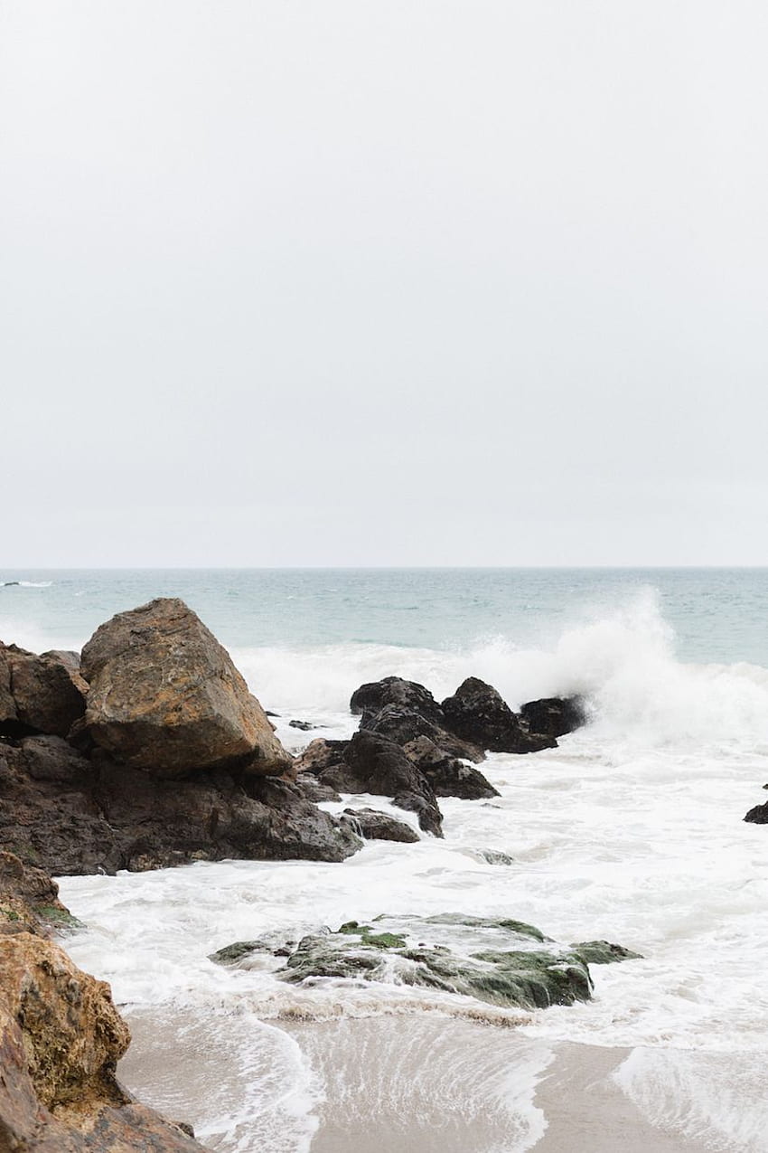 Waves crashing on the rocks at the beach - Coast