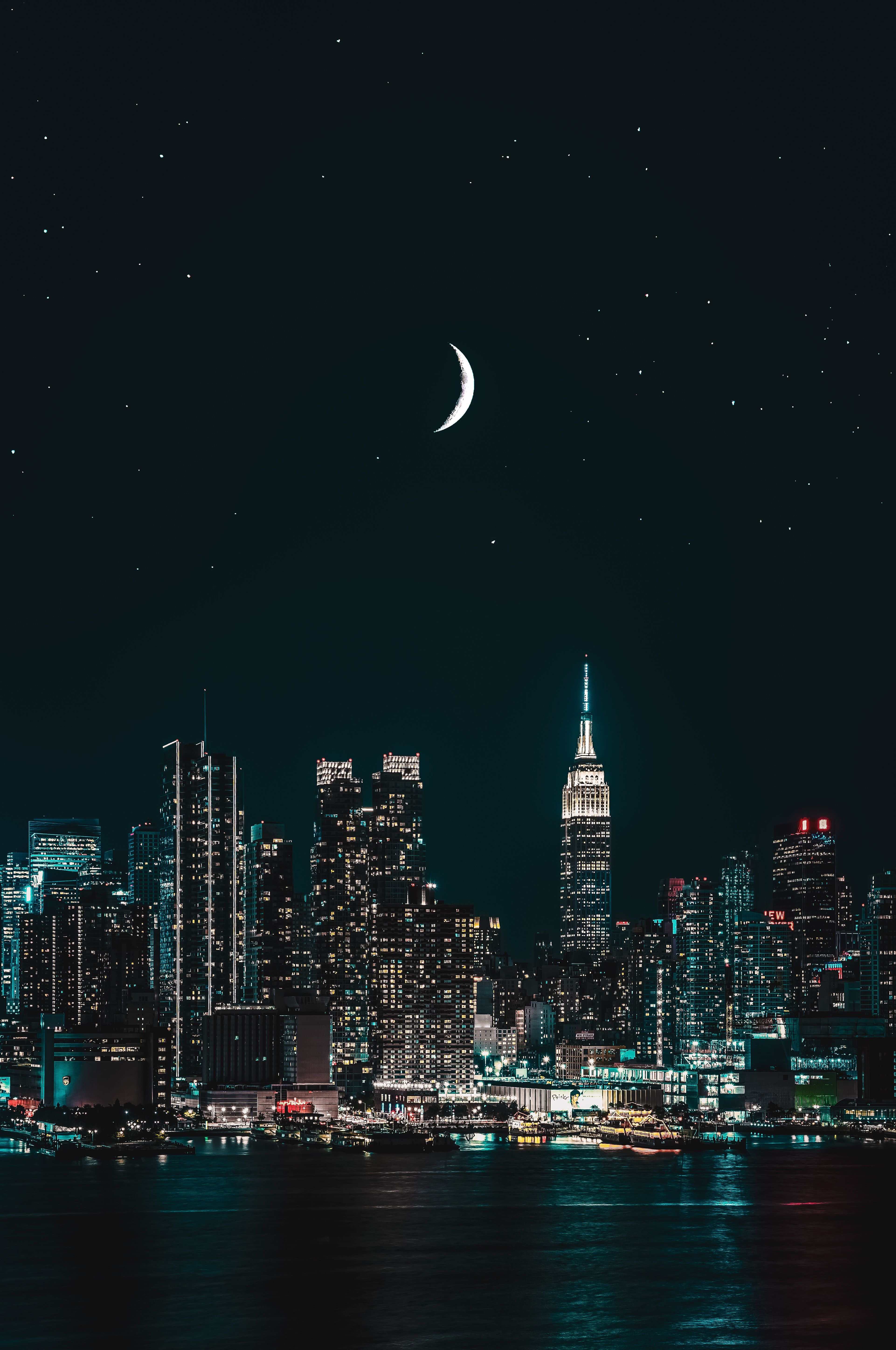 A city skyline with the moon in it - Skyline, night