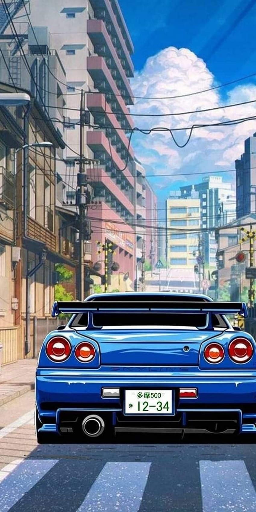 A blue car driving down the street - Nissan Skyline