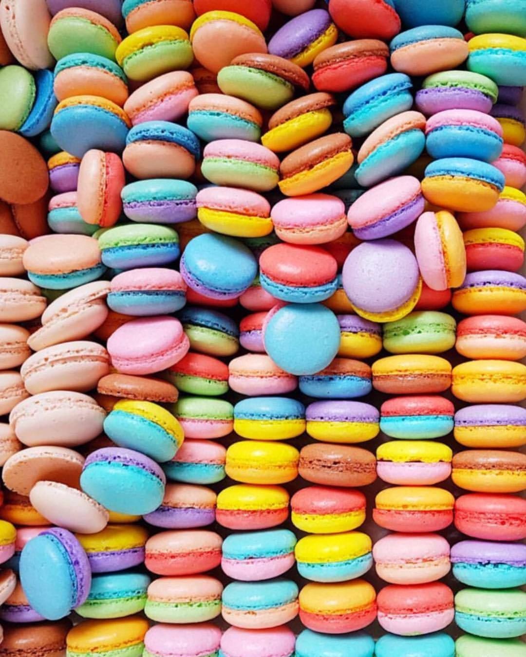 A pile of colorful macarons are stacked up - Colorful, macarons