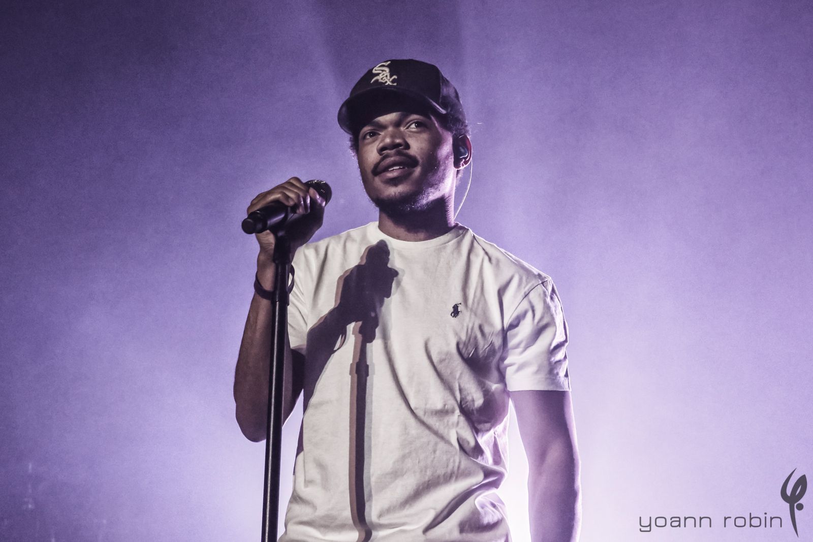 Chance the Rapper performs at the 2017 Lollapalooza festival in Chicago. - Chance the Rapper