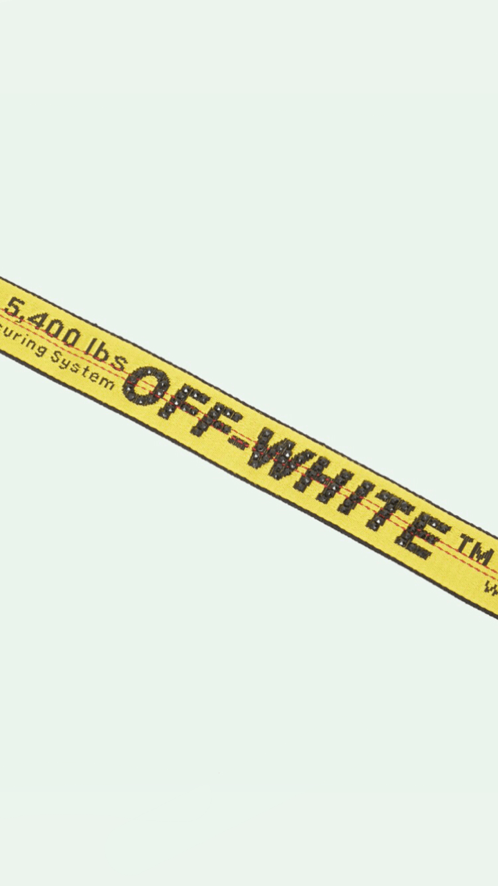 A yellow and black tape with the words off white on it - Off-White