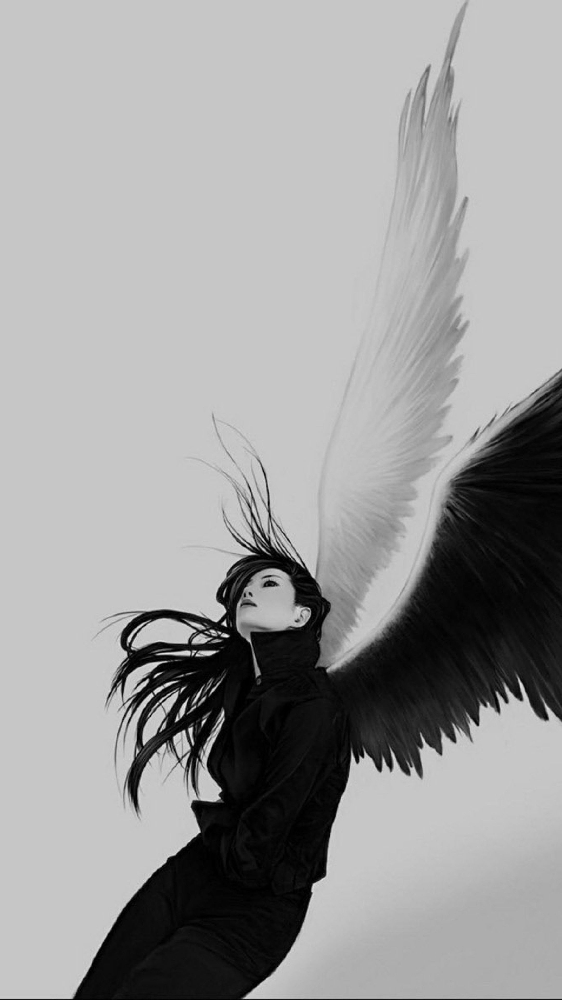 An artistic photo of a woman with black hair and black wings. - Wings