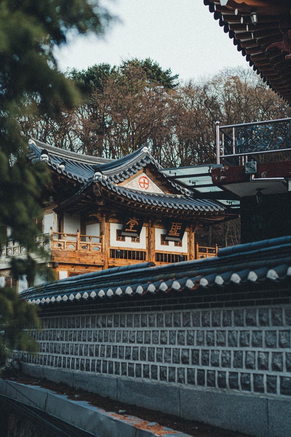 A building with an asian style roof - Seoul