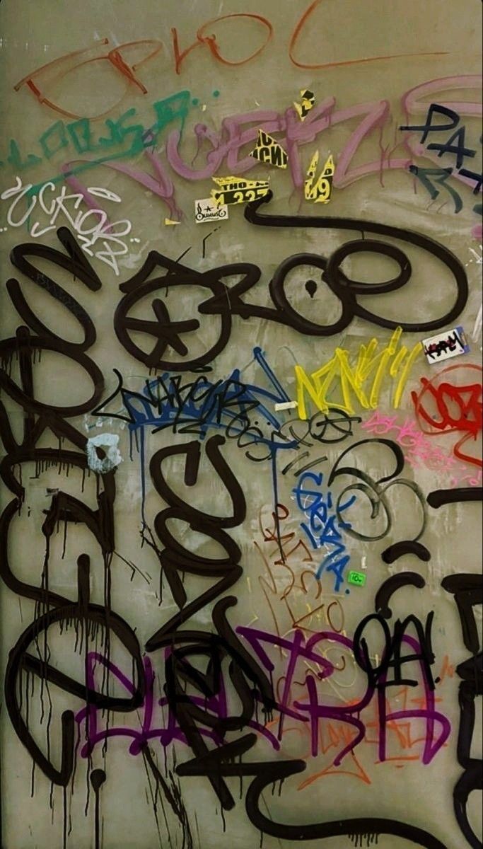 A wall with graffiti on it - Street art, graffiti