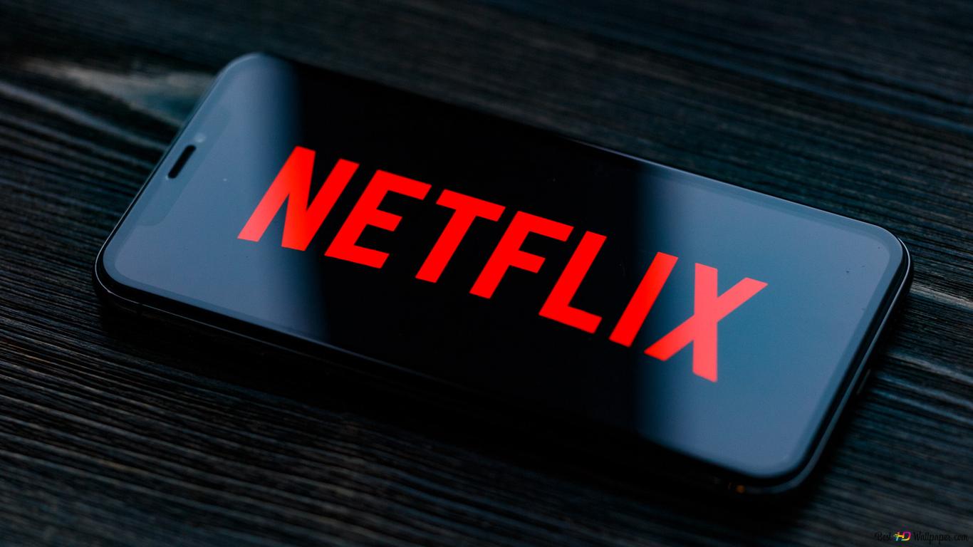 A black smartphone with the netflix logo on it - Netflix