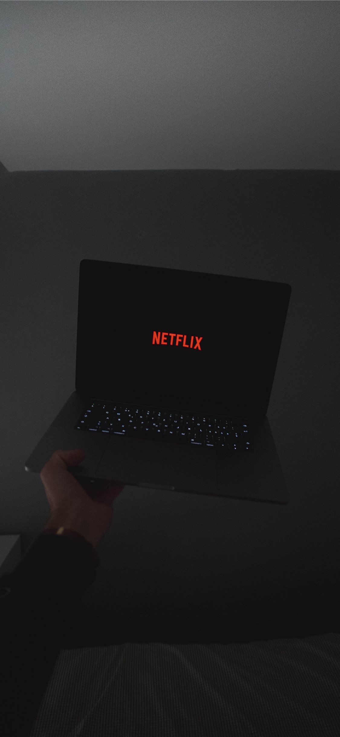 A laptop with netflix on the screen - Netflix