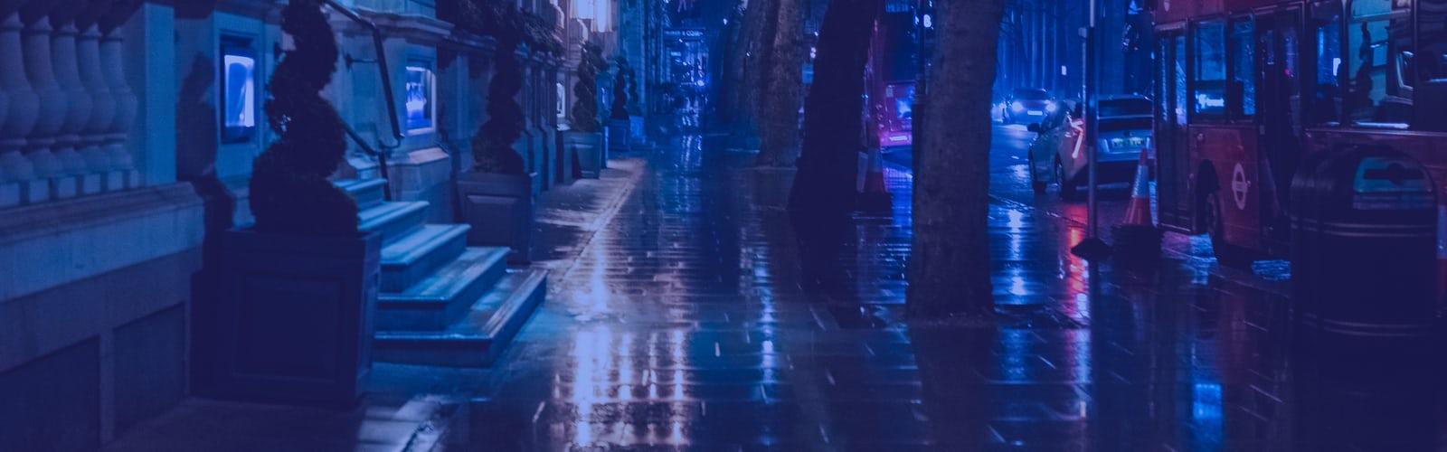 A city street with neon lights and rain - Dark vaporwave
